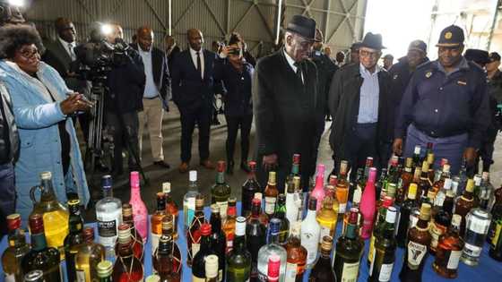 Police Minister Bheki Cele destroys 30k litres of alcohol in response to Khayelitsha mass shooting, SA reacts