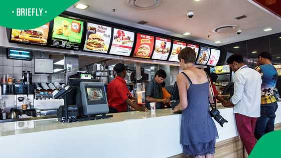 SA stunned by lady praying for everyone at McDonald’s after Nigerian man buys her food in Cape Town