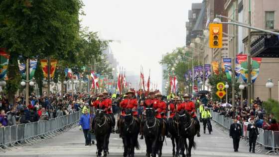 Canadians say goodbye to queen with horseback parade, Corgi gathering