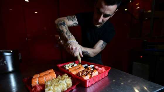 'War is war' but Ukraine sushi bar serves lunch on time