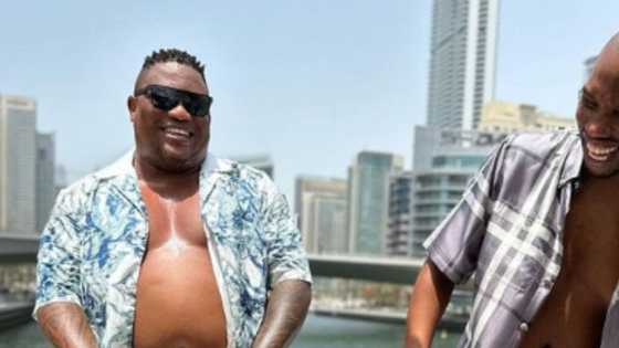 AKA's bestie Sim Dope seen with Phillip Maseko at Porsche dealership