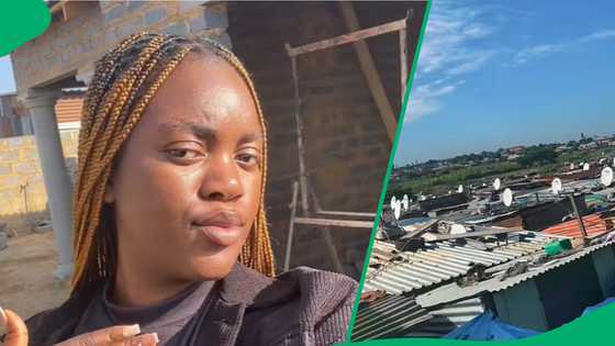 Woman celebrates building home afteer growing up in shack in TikTok video