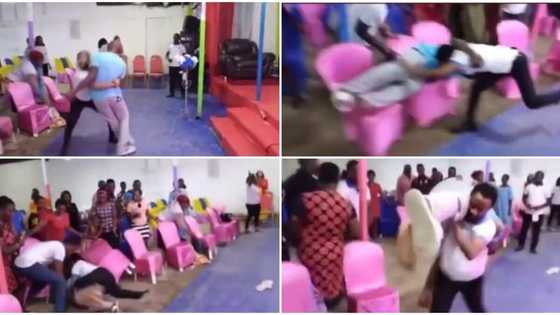 Pastor lifts man, throws him into the congregation during deliverance in video
