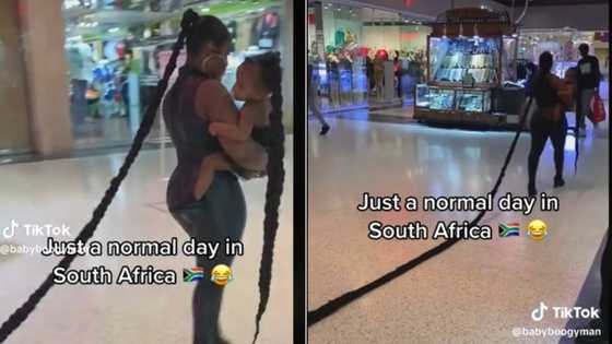Woman rocking meters long braid and baby with matching hair in mall has TikTok users laughing