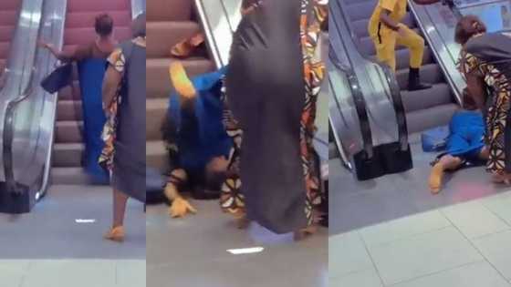 Woman's escalator fail gives Mzansi the giggles: "May my mother not be a victim"