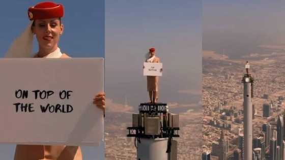 Air hostess climbs on top of world’s tallest building for 1-of-a-kind advert