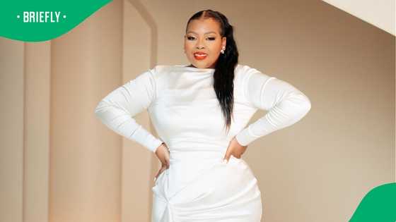 Anele Mdoda shows off her stunning curves in showstopper black dress