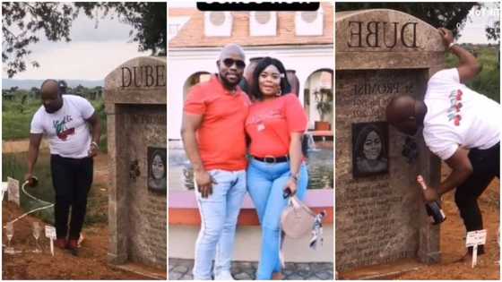 Emotional moment man visits wife's grave, pops wine, poses for pictures beside tombstone