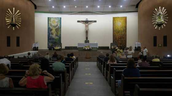 At Copacabana church, Catholic voters clash over Brazil election