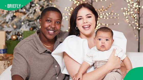 City Makoti and husband Sihle Dambuza read to their son in isiXhosa