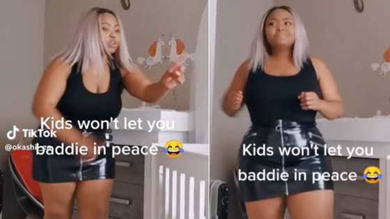 Mzansi mom tries to be baddie dancing on TikTok, kid not letting her prosper has netizens in tears