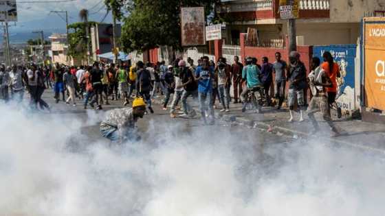 Thousands march in Haiti to protest calls for intervention