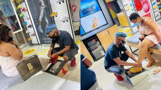 Somizi humbles himself to help customers try on his new shoes