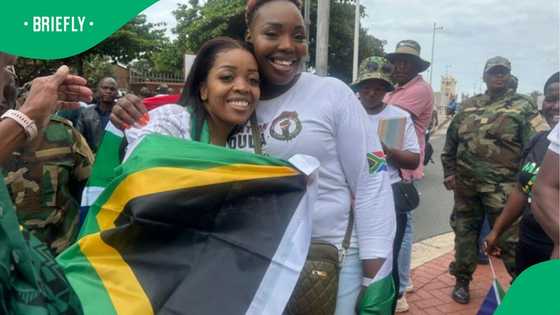 Government charges anti-immigration groups with inciting violence outside Durban school