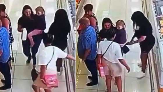 Woman with kid gets robbed by 3 thieves in grocery store, security footage leaves Mzansi fuming