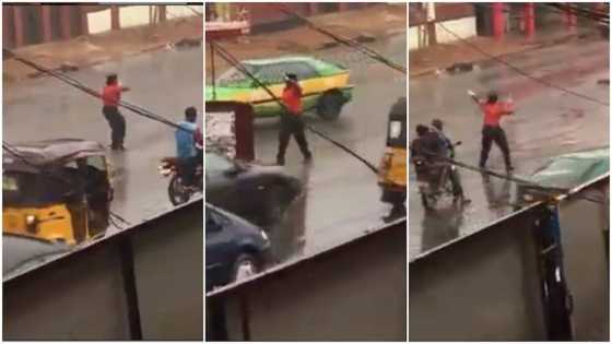 Female officer controls traffic under heavy rain, her video stirs reactions
