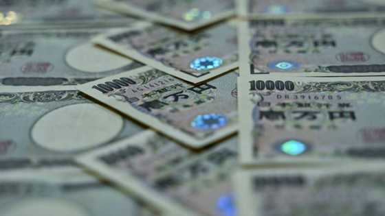 Asian markets drop after Wall St loss, yen rises ahead of BoJ