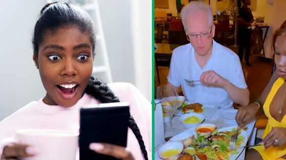 Husband left speechless as wife surprises him by removing wig during dinner date