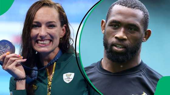 Siya Kolisi celebrates Tatjana Smith after winning 2 gold medals at the Paris Olympics 2024