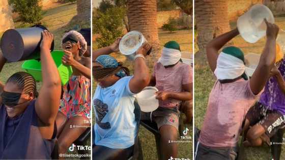 Video of viral blindfolded water passing challenge has 1000s tuning in and sitting on the edge of seats