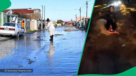 Man surfs in Cape Town floods in TikTok video, South Africa amused
