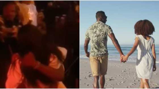 Lady goes on her knees to propose marriage to boyfriend, money rains on couple as man says yes, many react