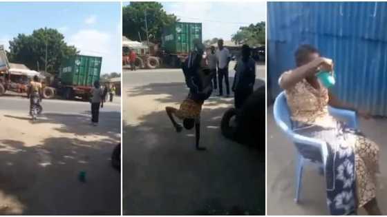 Woman causes stir on street, front flips on one hand from the road to her chair, video wows people