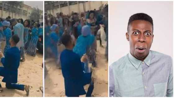 Lady ignores boyfriend kneeling on dusty ground, breaks into dancing with her friends in weird proposal video