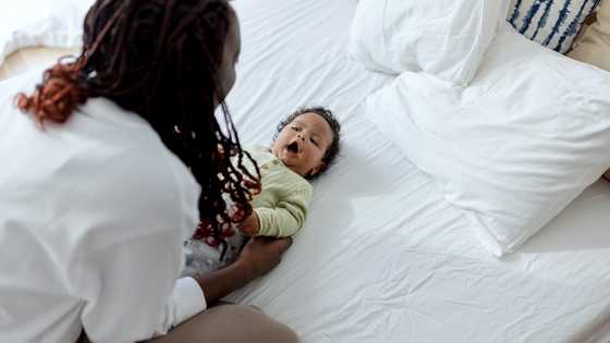 I was on a work trip when I saw a stranger tuck my son into bed—what I found made me seek revenge