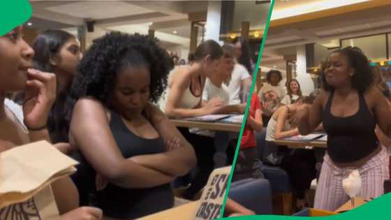 Woman dances at Spur after birthday ice cream arrives