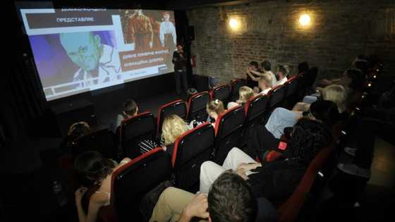 Ukraine's reopening cinemas offer refuge from reality -- and air raids