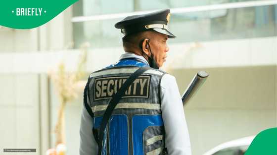 CCTV of ATM incident of armed guard running with gun drawn