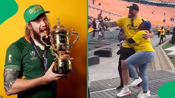 "She's not letting him go": Woman grabs onto RG Snyman while taking photos, SA entertained