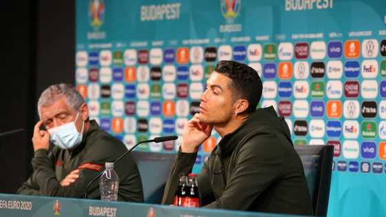 Cristiano Ronaldo rejects Coca Cola during EURO press conference, picks water instead