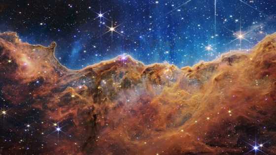 Cosmic cliffs and dancing galaxies: Webb begins era of discovery