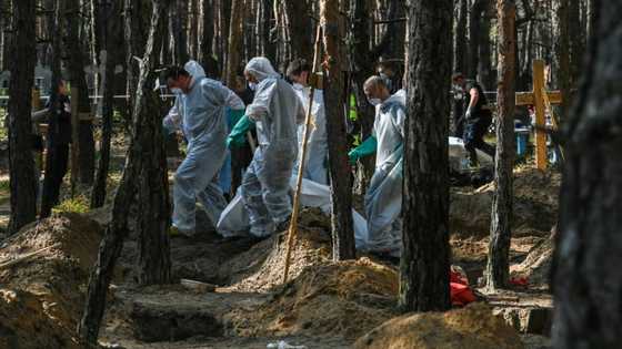 Kremlin dismisses mass burial discoveries as 'lies'