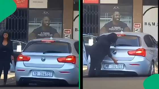 Mzansi cracks up over woman struggling to open BMW boot in viral video