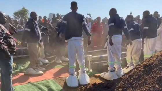 TikTok video of men wearing heavy huge shoes at a funeral sparks hilarious reactions online: "What are those?"