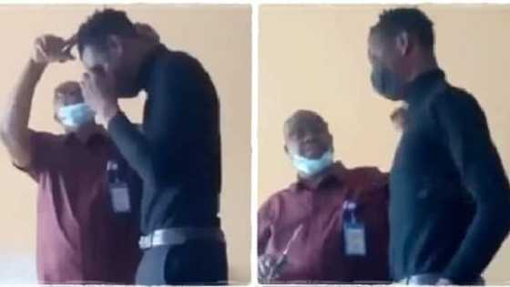Lecturer turns classroom into barber salon, uses scissors to shave student with dreadlocks