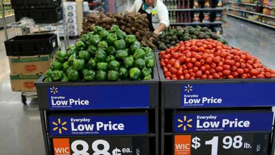 Walmart cuts profit outlook as inflation bites shoppers