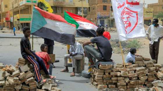 Sudan anti-coup protests hold firm, sceptical of army promises