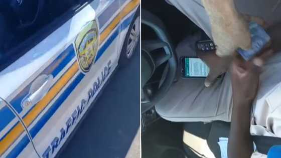 Haibo: Traffic cop filmed allegedly taking bribe money from truck driver