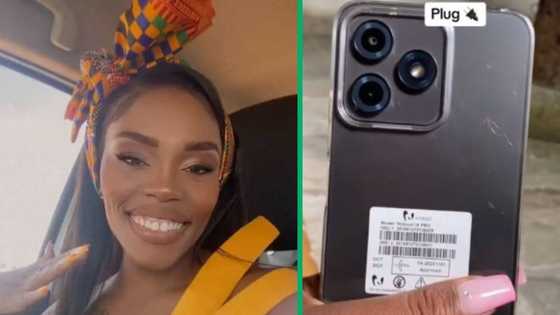 Woman in TikTok video shows Mzansi cheap "iPhone" from Ackermans, viewers amused by lady's plug