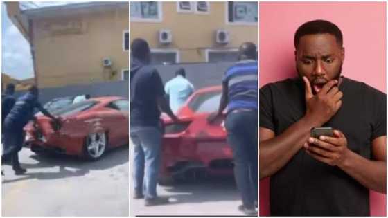 Man surprised as he sees 2 men pushing Ferrari in Lagos, Nigerians 'roast' him