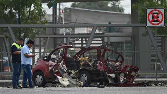 Police killed, guards held in gang violence-stricken Ecuador