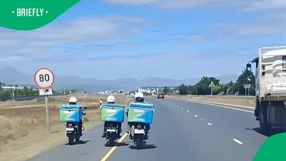 2 Checkers60 drivers on bikes use legs to push colleague running out of fuel on road in video