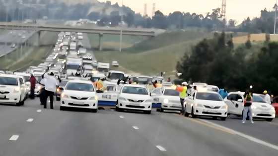 Joburg e hailers protest with slain driver's body amid safety concerns, SA bemoans situation