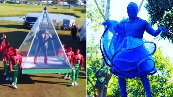 Durban July: Somizi Mhlongo makes theatric entrance in video, media personality covers face in 2 of his 7 "Out of This World" outfits