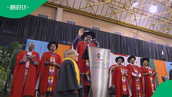 Graduate with disability earns degree achieving more than 15 distinctions in video