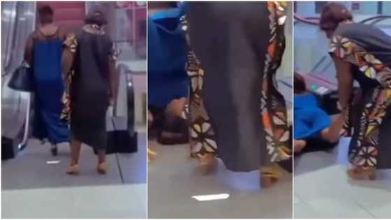 Moment woman embarrassingly falls and somersaults after stepping on escalator captured on camera